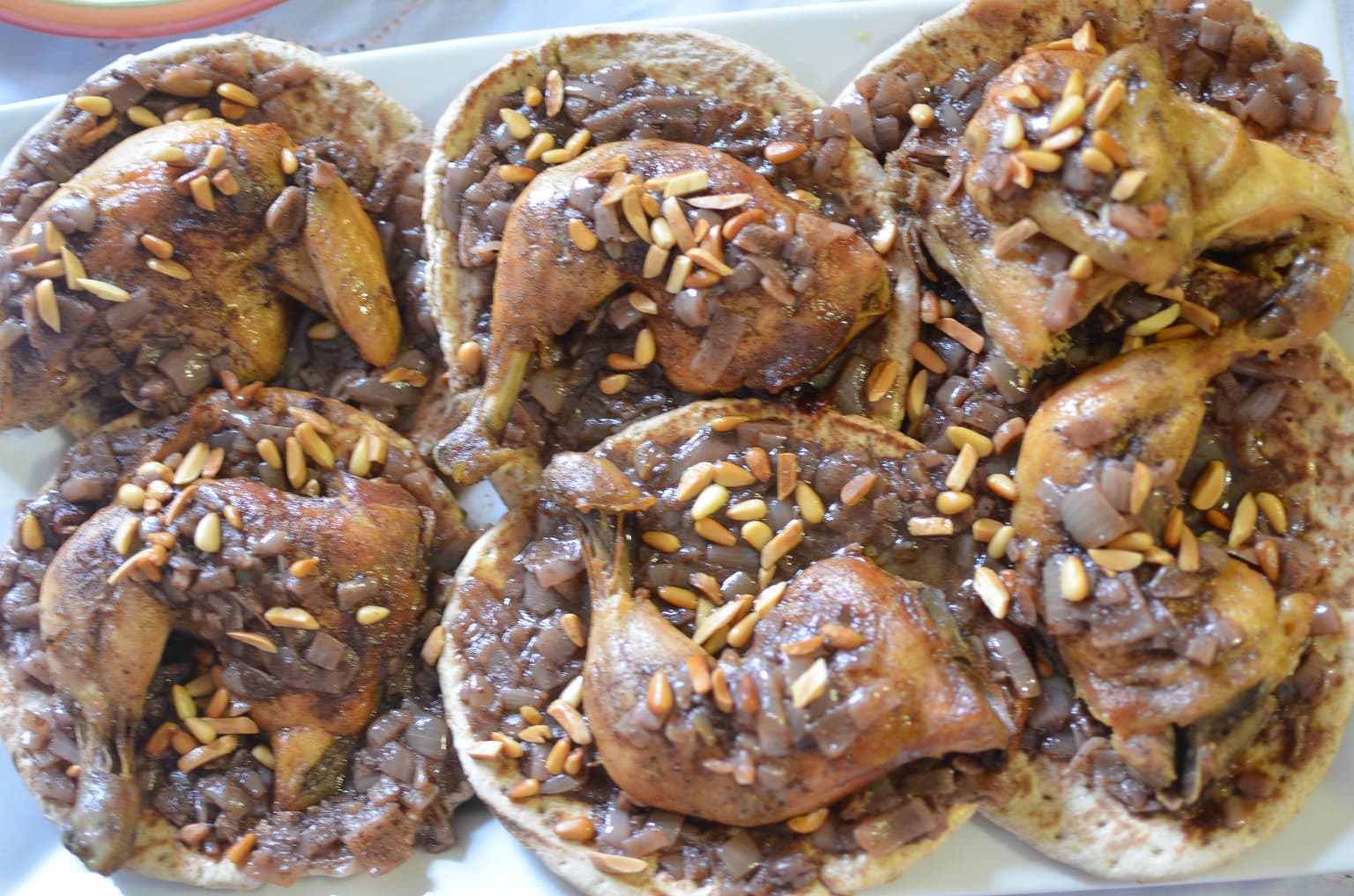 Traditional Palestinian musakhan with bread, chicken and onions