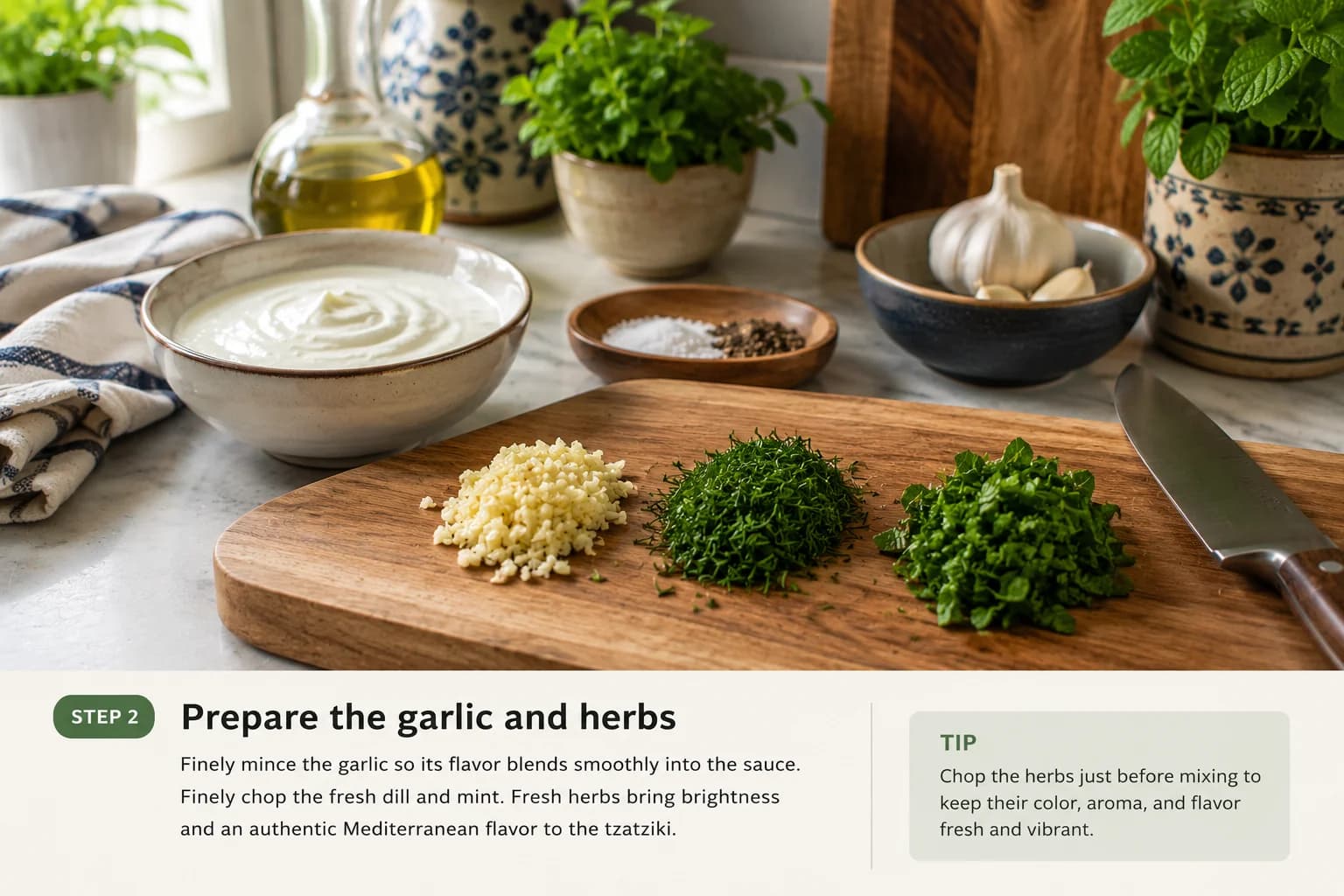 Minced garlic with freshly chopped dill and optional mint prepared for Lebanese-style tzatziki.