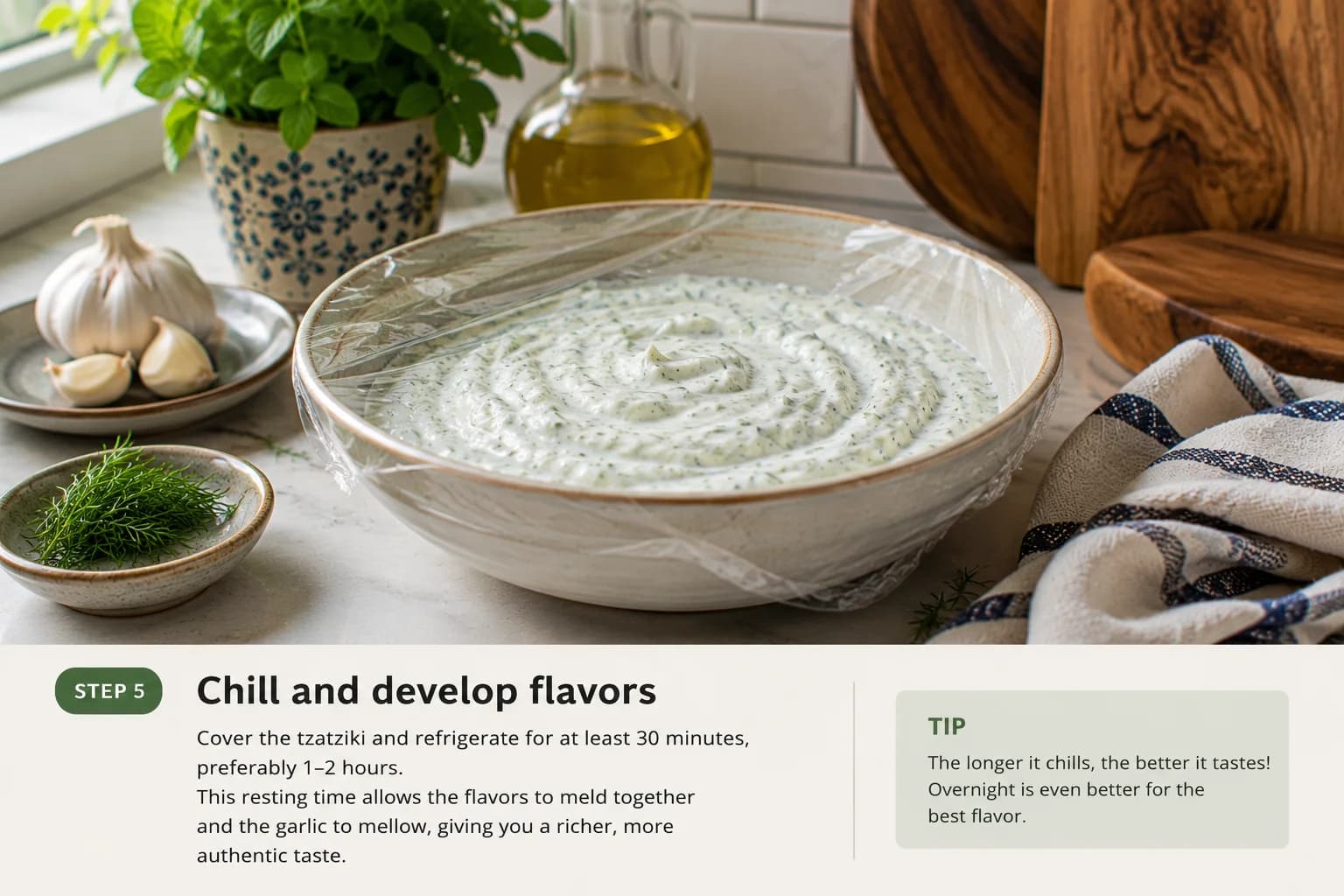 Creamy Lebanese-style tzatziki covered and chilled in the refrigerator so its flavors can develop.